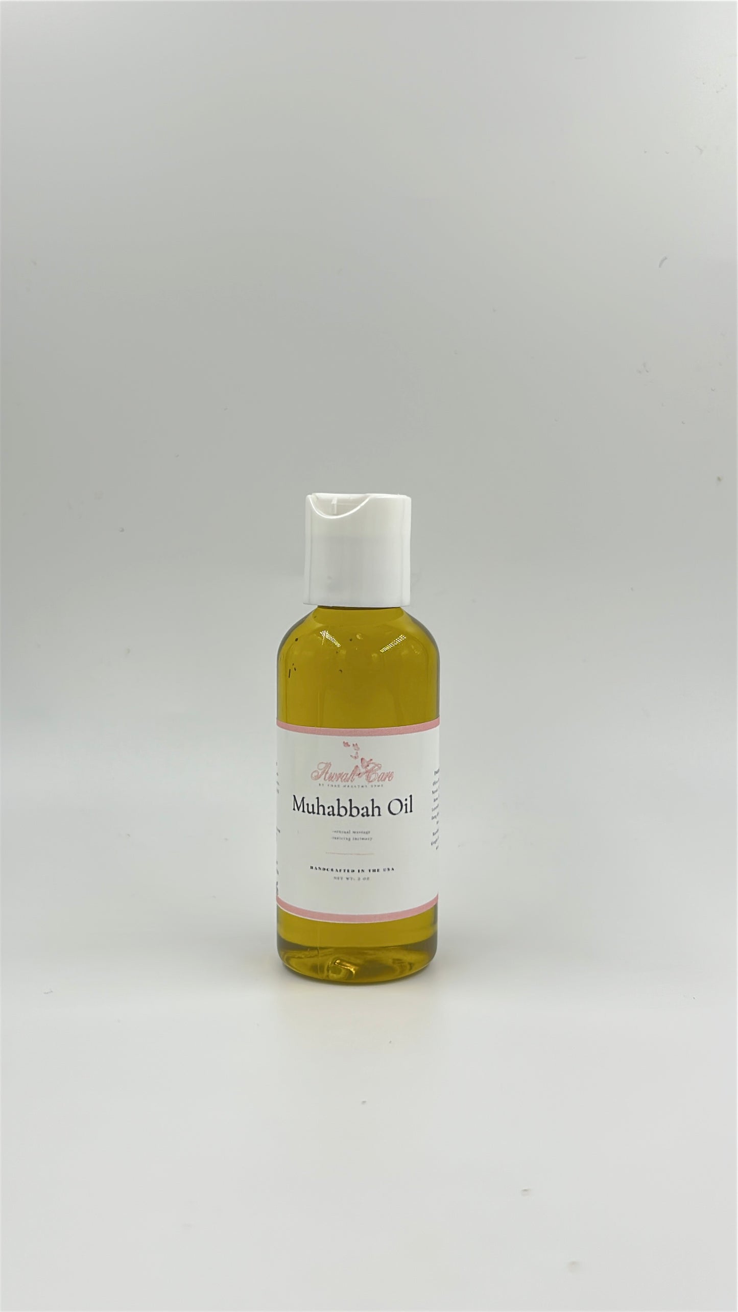 Bottle of Muhabbah Oil on a white background